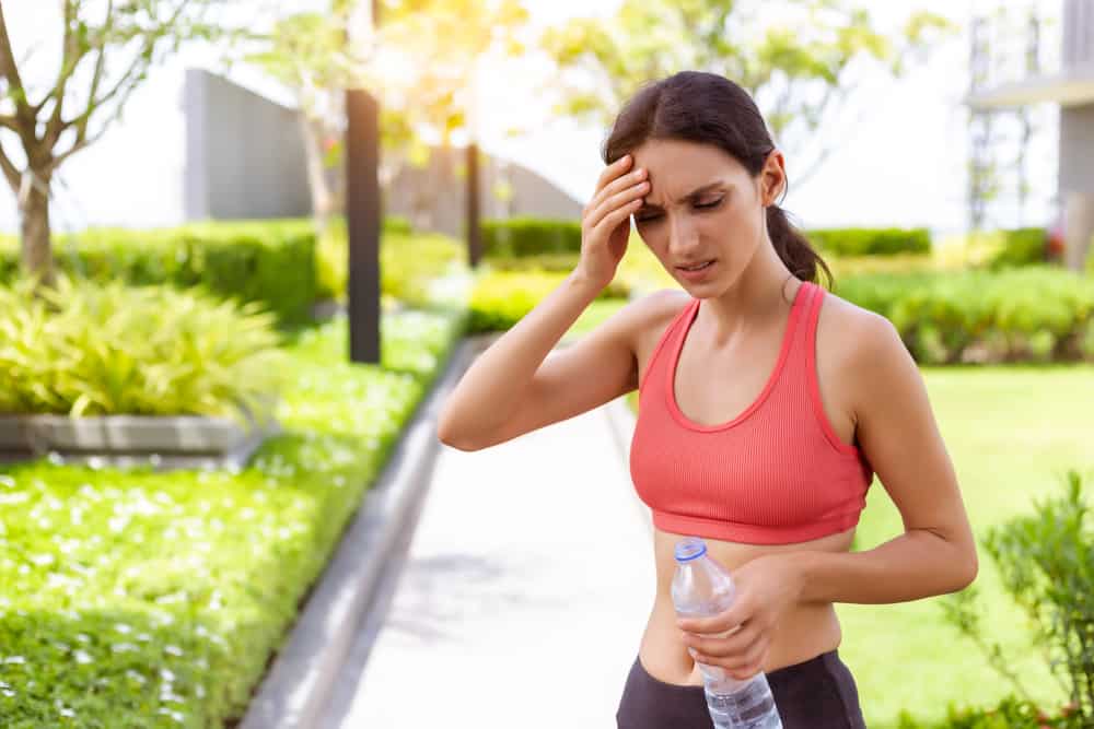 woman thirsty dehydrated in hot weather